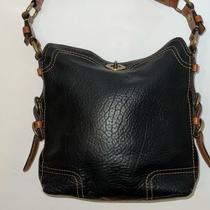 Black and brown hobo styled Coach handbag